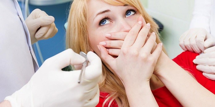 What are the signs of dental phobia