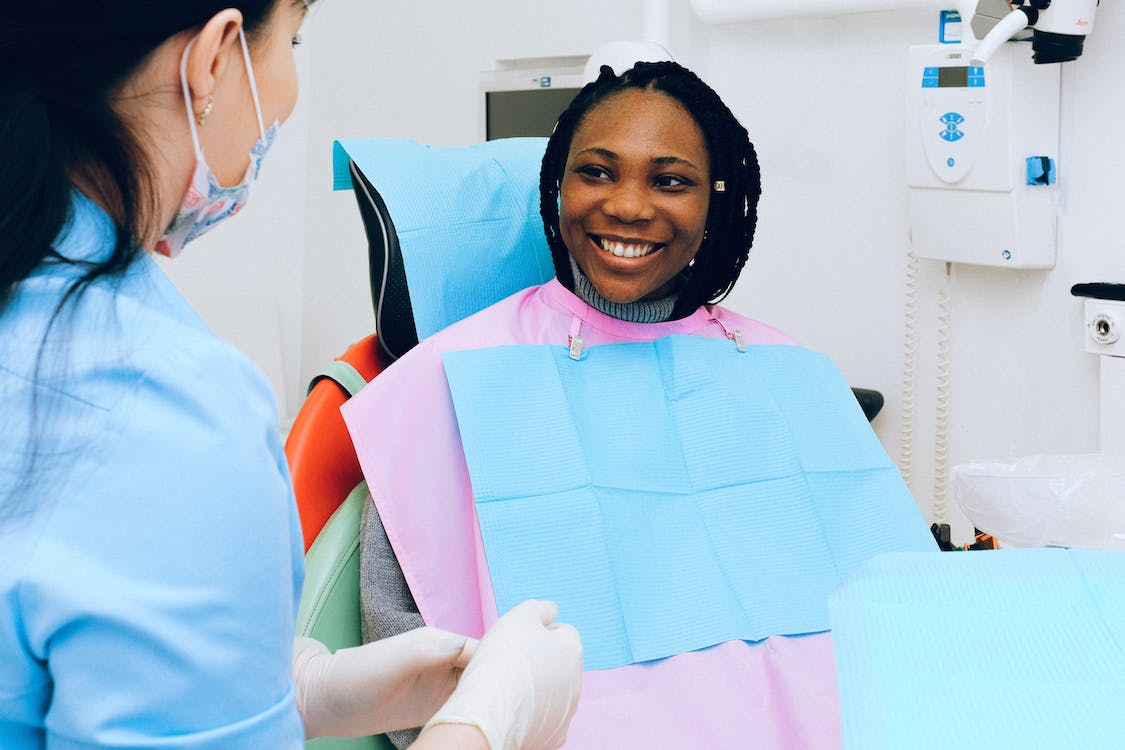 A person smiling after their dentist appointment