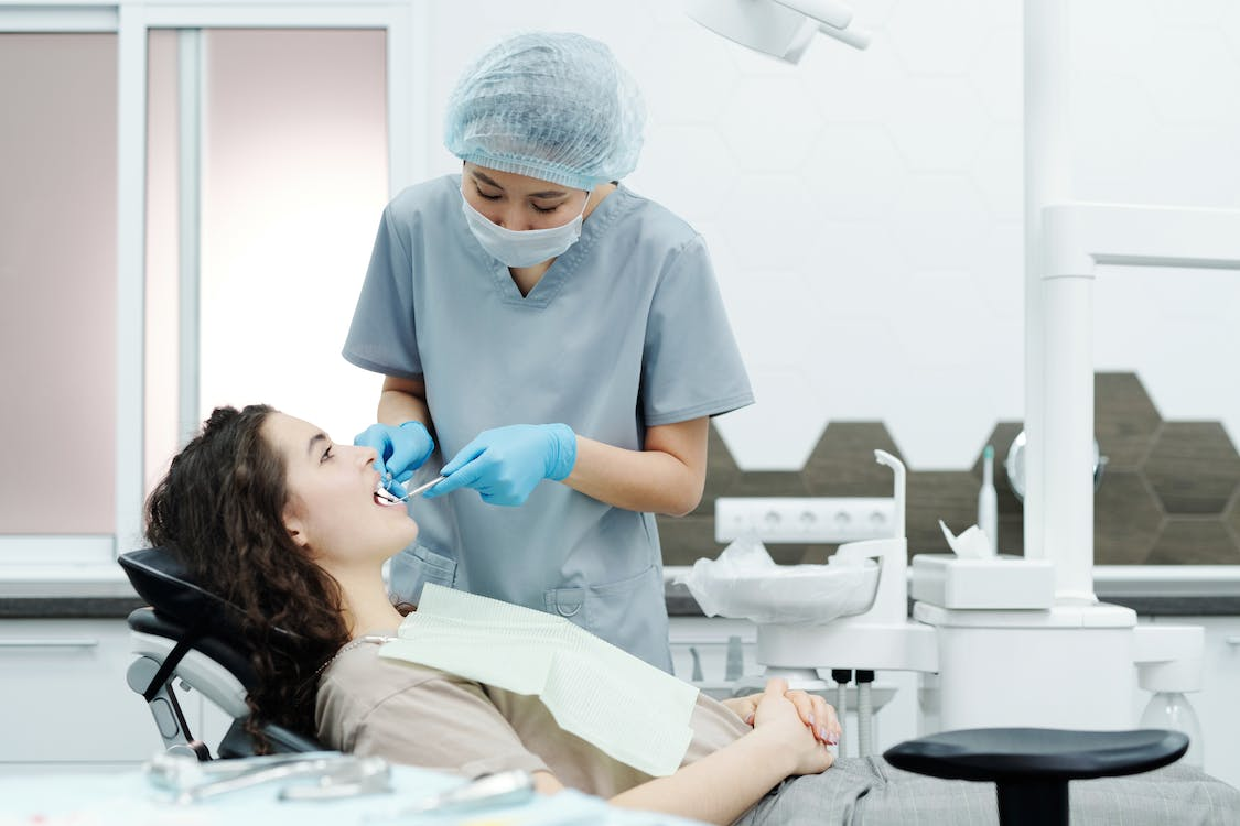 A patient and dentist in the clinic