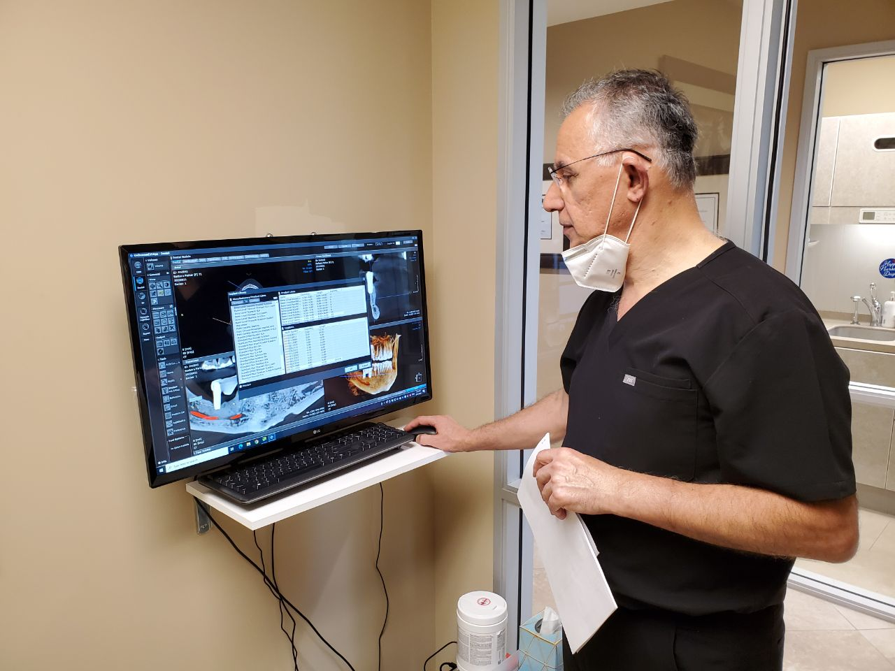 An oral surgeon in Mission Viejo making a dental treatment plan