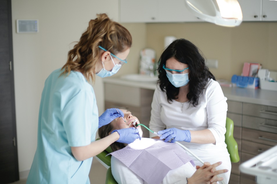 A woman getting dental treatment in the clinic