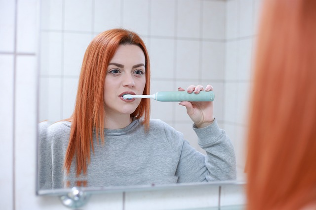 A girl brushing her teeth