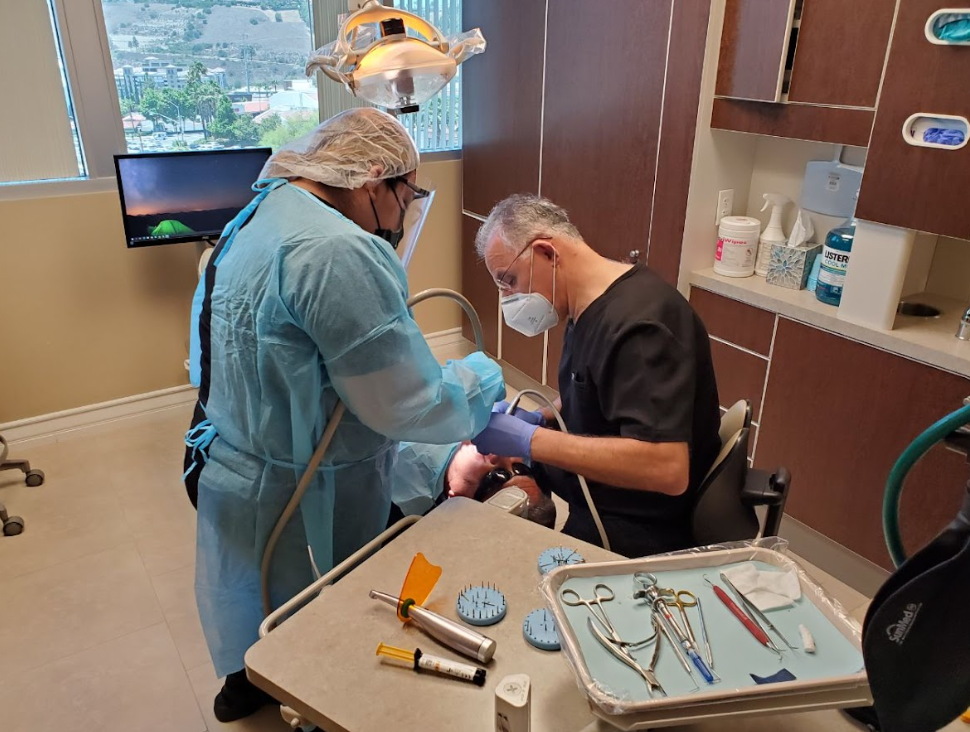 People at work in a dental clinic